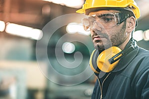 Industrial Engineers in Hard Hats.Work at the Heavy Industry Manufacturing Factory.industrial worker indoors in factory. man