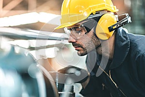 Industrial Engineers in Hard Hats.Work at the Heavy Industry Manufacturing Factory.industrial worker indoors in factory. man