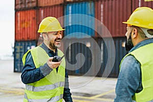 Industrial engineers working in logistic terminal of container cargo