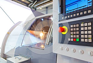 Industrial equipment of cnc milling machine center in tool manufacture workshop.