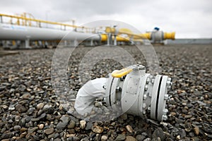 Industrial equipment pipes, manometer/pressure gauge, levers, faucets, indicators in a natural gas compressor station