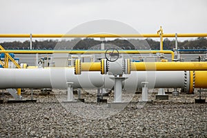 Industrial equipment pipes, manometer/pressure gauge, levers, faucets, indicators in a natural gas compressor station