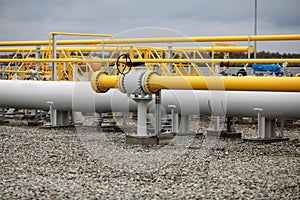 Industrial equipment pipes, manometer/pressure gauge, levers, faucets, indicators in a natural gas compressor station