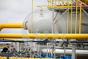 Industrial equipment pipes, manometer/pressure gauge, levers, faucets, indicators in a natural gas compressor station