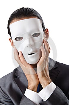 Industrial espionage concept - masked businessman