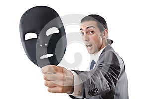 Industrial espionage concept - masked businessman