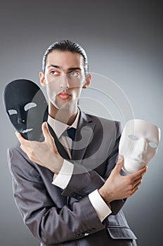 Industrial espionate concept - masked businessman