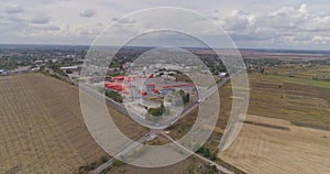 Industrial exterior of a modern factory. Modern factory top view, flying around a new modern factory in orange colors.