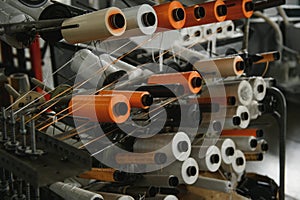 Industrial fabric production line. Weaving looms at a textile factory