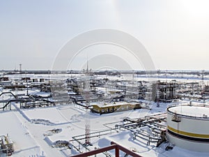 The industrial facility of the oil company. Oilfield equipment. Industrial oil and gas infrastructure.