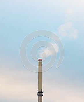 Industrial factory chimney smoke on blue sky pollution