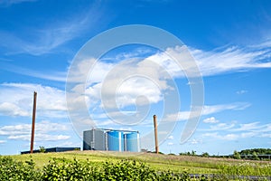 Industrial factory with large silos in blue colors