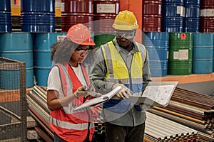 Industrial factory and manufacturing concept. Engineering with technician inspect the production of goods