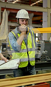 Industrial factory and manufacturing concept. Engineering with technician inspect the production of goods