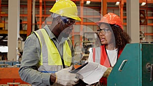 Industrial factory and manufacturing concept. Engineering with technician inspect the production of machines