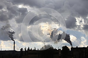 Industrial factory pollutes atmosphere and ecology harmful emissions of chemical processing