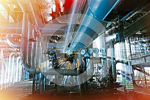 Industrial Factory. Various mechanisms and metal pipes. Toned image. Motion blur effect.