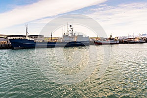 Industrial fishing ships moored in harbour
