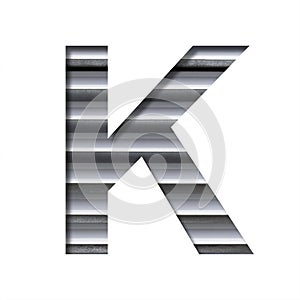 Industrial font. The letter K cut out of paper on the background of industrial ventilation grates or blinds. Set of steel