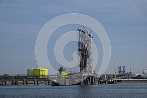 Industrial gas installation. Transshipment and Storage for LNG or liquefied natural gas in the port of Rotterdam. Ships moor for