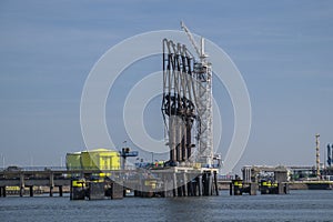 Industrial gas installation. Transshipment and Storage for LNG or liquefied natural gas in the port of Rotterdam. Ships moor for
