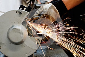 Industrial grinder and sparks photo