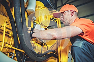 Industrial Heavy Equipment Mechanic at Work