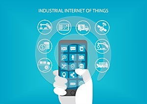 Industrial internet of things concept. Hand holding modern mobile device like smart phone