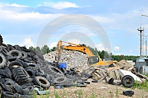 Industrial landfill for recycling used rubber tires and old concrete structures.