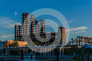 Industrial landscape with the moon