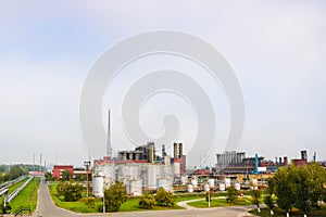 Industrial landscape, panoramic view of production. Chemical plants, columns, generators, pipes. Oil treatment systems.