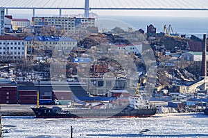 Industrial landscape with a view of the Diomidovsky port. Vladivostok, Russia