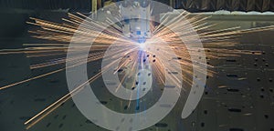 Industrial Laser cutting processing manufacture technology of flat sheet metal steel material with sparks