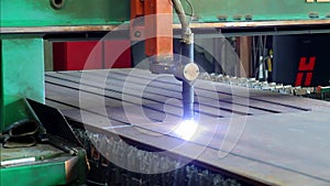 The industrial laser cutting torch cuts preparations from metal. Clip.