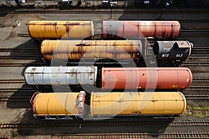 Industrial logistics Top view of various railway wagons and tanks