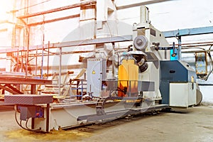 Industrial machine in the factory at metalworks. Warehouse,industrial interior, production zone. Closeup photo