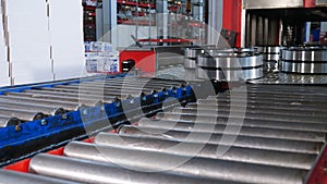 Industrial and machinery concept. A tecnological part of bearing production and assembling. Conveyor in bearing factory