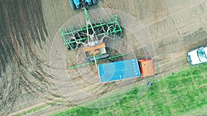 Industrial machines preparing for planting in the field