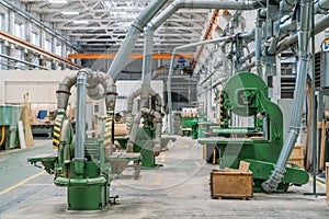 Industrial machines for processing wood in workshop of woodworking plant for making wood molds