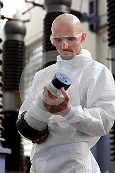 Industrial man holding object