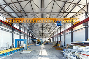 Industrial manufactory workshop for production sandwich panels for construction. Modern manufacturing storage factory interior photo