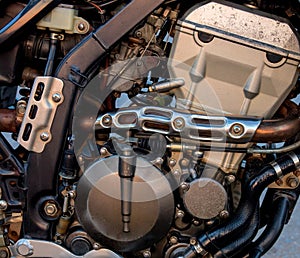 Industrial mechanical background. Modern motorbike engine. Vintage motorcycle closeup.