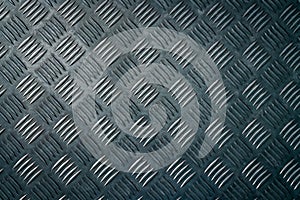 Industrial metal checker plate. Metal checker plate texture background. Metal checkerplate for anti skid. Embossed metal sheet photo