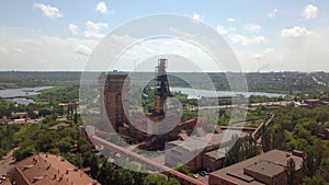 Industrial mining conveyor red iron ore aerial drone right camera movement Krivoy Rog Ukraine