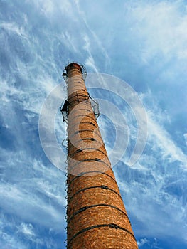 Industrial Old Brick Chimney on blue sky