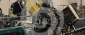 Industrial operating metal sheet profiling machine at manufacturing factory