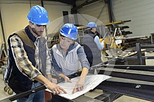 Industrial peope discussing concept in factpry photo