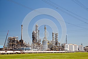 Industrial Petroleum Refinery Plant Smokestacks and Piping