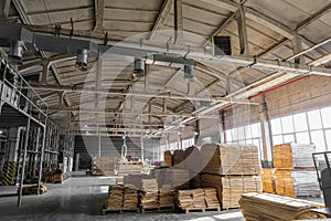 Industrial plant shop with stocked wooden veneer for plywood and furniture production