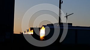 Industrial plant at sunset, silhouettes and light 4